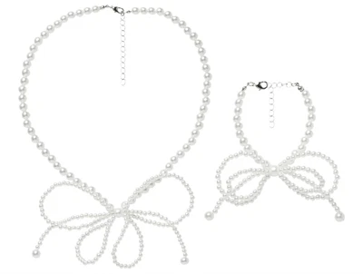 smykkesæt fra Name It i hvid med perler og sløjfe